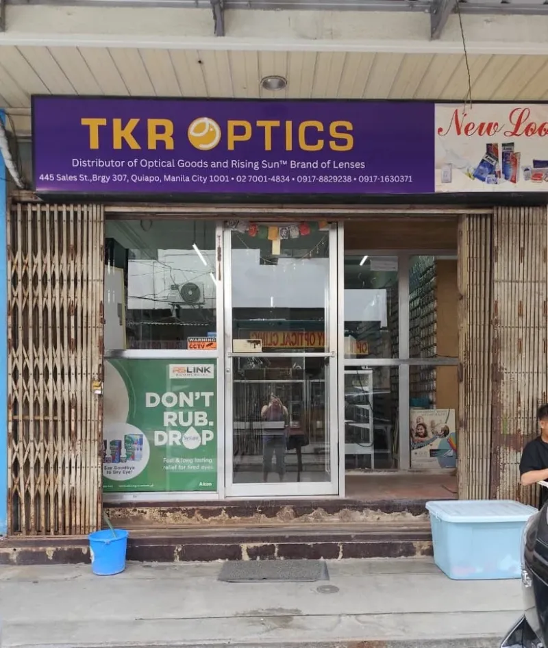 TKR Optics storefront on Sales Street, Quiapo, with its purple sign reading Distributor of Optical Goods and Rising Sun Brand of Lenses